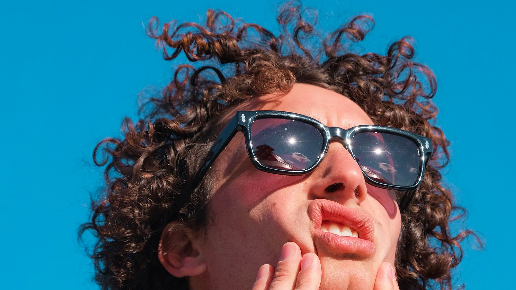 Man wearing a pair of Arman Sunglasses from Nerdy Frames